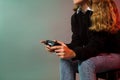 Girl holding joystick and play virtual game