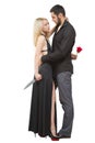 Girl holding knife traitor. man with rose in his