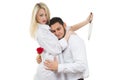 Girl holding knife traitor. man with rose in his