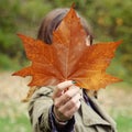 Girl holding leaf Royalty Free Stock Photo