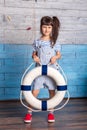 Girl holding a life preserver