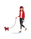 Girl, holding little dog on leash, walks in fresh air. Royalty Free Stock Photo