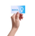 Girl holding medical business card isolated on white. Women`s health service Royalty Free Stock Photo