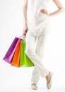 Girl holding multicolored shopping paper bags Royalty Free Stock Photo