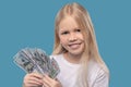 Girl holding one hundred dollar bills in her hands Royalty Free Stock Photo