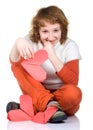 Girl holding origami heart Royalty Free Stock Photo