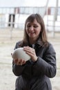 Girl holding ostrich egg Royalty Free Stock Photo