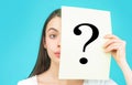 Unknown woman holding question mark. Girl holding paper question mark. Anonymous, woman question, incognita. Anonymous Royalty Free Stock Photo