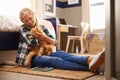 Girl holding pet cat in her bedroom Royalty Free Stock Photo