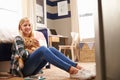 Girl holding pet cat in her bedroom Royalty Free Stock Photo