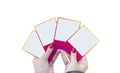 Girl holding photo square frames, pins and paper stickers isolated