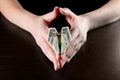 Girl holding a plane from a one dollar bill Royalty Free Stock Photo