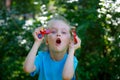 girl holding popular fidget spinner toy