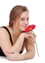 Girl holding a red flower Royalty Free Stock Photo