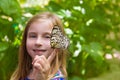 Girl holding Rice Paper butterfly Idea leuconoe Royalty Free Stock Photo