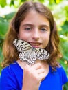 Girl holding Rice Paper butterfly Idea leuconoe Royalty Free Stock Photo