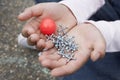 Girl Holding Rubber Ball And Jacks Royalty Free Stock Photo