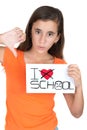 Girl holding a sign with the words I hate school Royalty Free Stock Photo