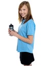 Girl holding sipper bottle. Break from gym workout Royalty Free Stock Photo