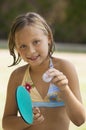 Girl holding table tennis paddle Royalty Free Stock Photo