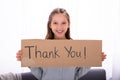 Girl Holding Thank You Placard Royalty Free Stock Photo