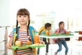 Girl holding tray with healthy food