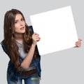 Girl holding white billboard Royalty Free Stock Photo