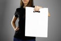 Girl holding a white plastic bag. Close up. Isolated background Royalty Free Stock Photo
