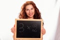 Girl holding 3x2 board Royalty Free Stock Photo