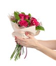 the girl holds a bouquet of flowers, gives or accepts flowers. gifts holidays and birthdays