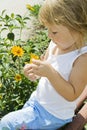 Girl holds flower