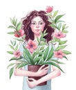 Girl holds a flower pot in her hands