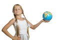 Girl holds the globe collected from puzzle Royalty Free Stock Photo