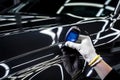 Measuring the thickness of a car paint coating with a thickness gauge Royalty Free Stock Photo