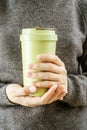 Girl holds in her hands bamboo cup. Zero waste concept Royalty Free Stock Photo