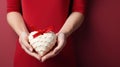 girl holds in her hands a delicious gingerbread in glaze in the shape of a heart, valentines day, banner, poster