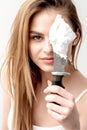 Girl holds knife with shaving foam Royalty Free Stock Photo