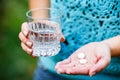 Girl holds the Medicinal pills