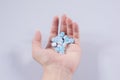 Girl holds in the palm of her hand a pill on white isolated background. medicine, paracetamol Royalty Free Stock Photo