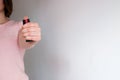 Girl holds a self-defense pepper spray Royalty Free Stock Photo