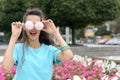 Girl holds a stick with two marshmallows Royalty Free Stock Photo