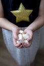 The girl holds the sugar cubes. Royalty Free Stock Photo