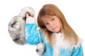 Girl holds winter fur cap Royalty Free Stock Photo