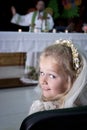 Girl in holy communion dress and veil Royalty Free Stock Photo