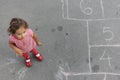 Girl and hopscotch Royalty Free Stock Photo