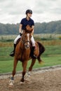 Girl, horse rider, during a match, in torque, high speed, in motion blur. Equestrian sport in details. Sport horse and rider Royalty Free Stock Photo