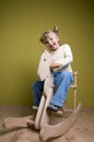 Girl and horse - rocking chair Royalty Free Stock Photo