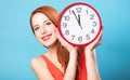 Girl with huge clock Royalty Free Stock Photo