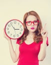 Girl with huge clock Royalty Free Stock Photo