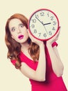 Girl with huge clock Royalty Free Stock Photo